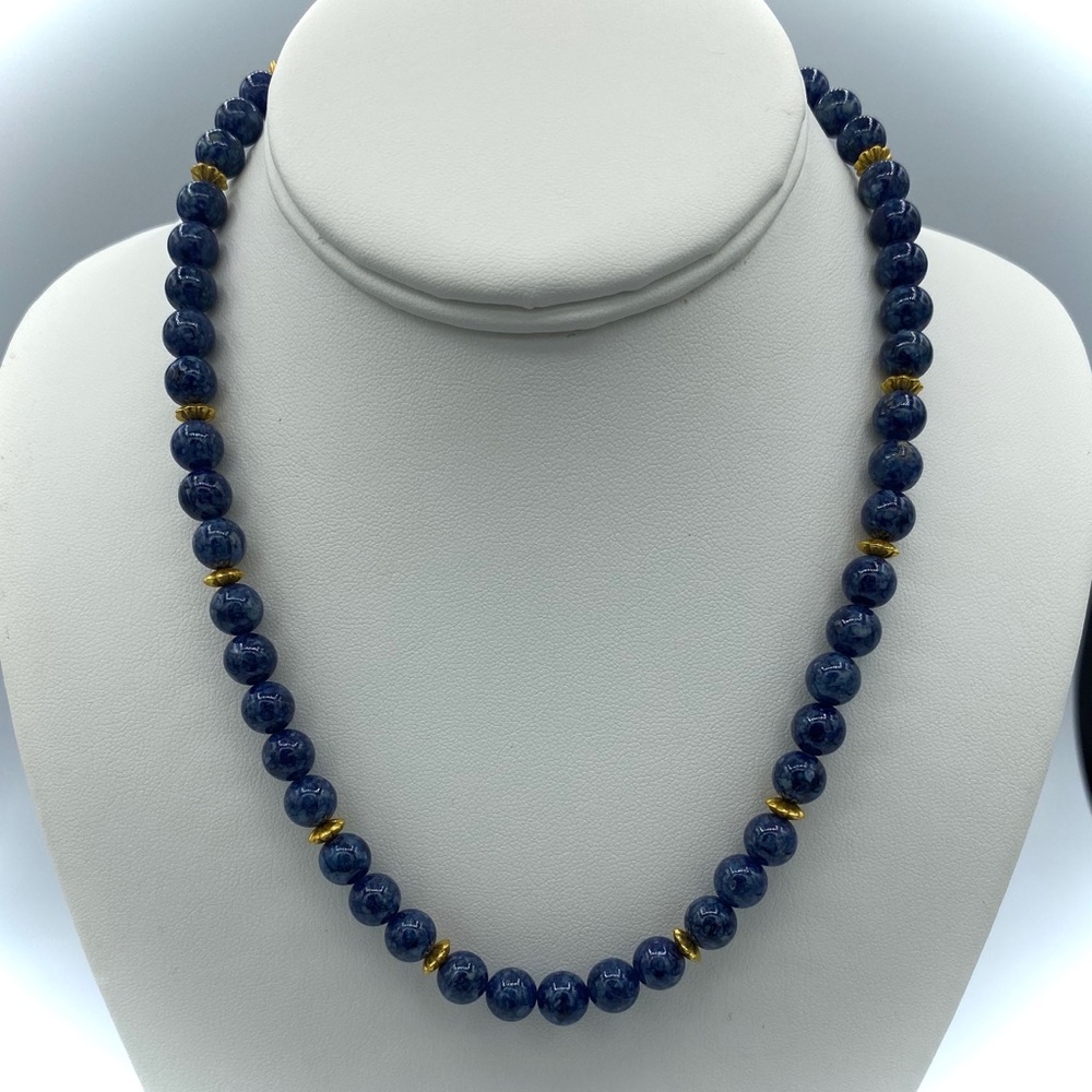 Vintage lapis lazuli strand. Accented with gold